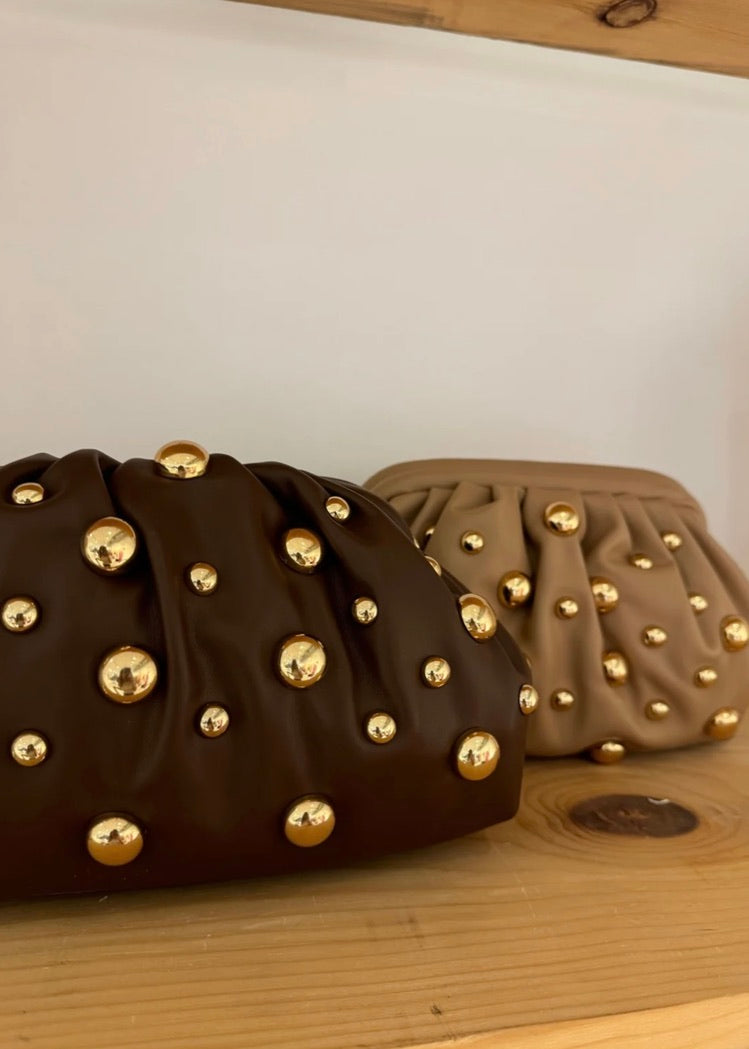 STUDDED CLUTCH